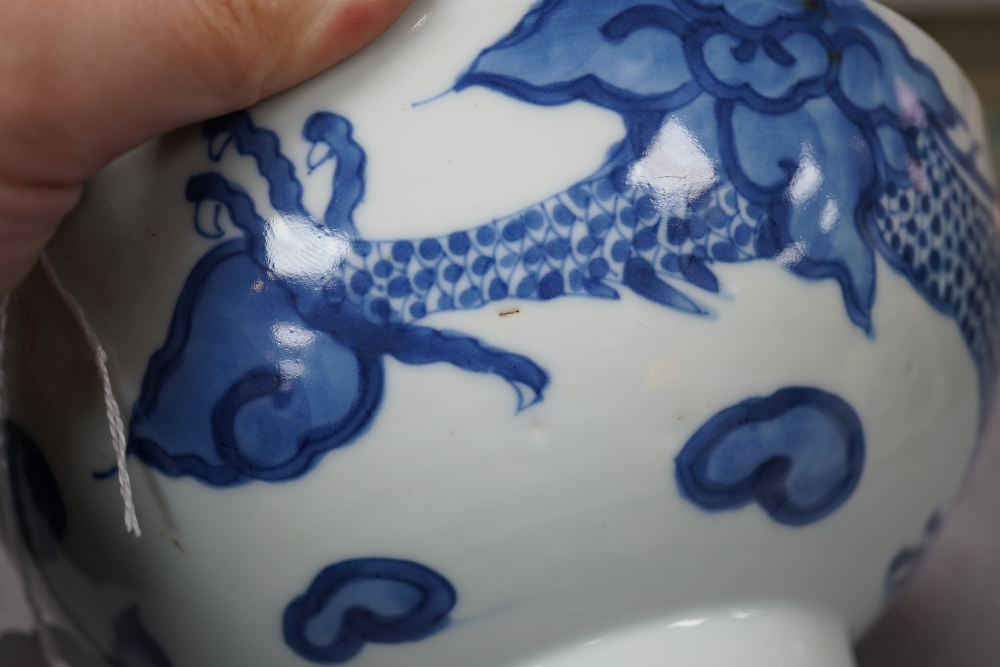 A Chinese blue and white ‘cloud and dragon’ bowl, Yongzheng mark and period (1723-35)